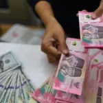 Nilai Tukar Rupiah Melemah 0,30% ke Rp18.135 per Dolar AS pada 27 Oktober, Sentimen Global Masih Membayangi