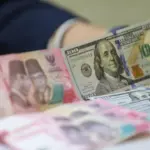 Rupiah Dibuka Melemah ke Rp 18.031 per Dolar AS, Pergerakan Mata Uang Global Jadi Sorotan Rupiah Dibuka Melemah ke Rp 18.031 per Dolar AS, Pergerakan Mata Uang Global Jadi Sorotan