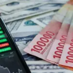 Rupiah Tembus Rp18.038 per Dolar AS, Analis Ungkap Tekanan MSCI Hingga Risiko Cadangan Devisa BI Rupiah Tembus Rp18.038 per Dolar AS, Analis Ungkap Tekanan MSCI Hingga Risiko Cadangan Devisa BI
