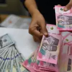 Rupiah Tembus Rp18.038 per Dolar AS pada 16 Oktober, Sentimen MSCI Tekan Nilai Tukar Rupiah Tembus Rp18.038 per Dolar AS pada 16 Oktober, Sentimen MSCI Tekan Nilai Tukar