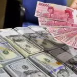 Rupiah Ditutup Melemah ke Rp18.135 per Dolar AS, Tertekan Harga Minyak dan Arus Asing Rupiah Ditutup Melemah ke Rp18.135 per Dolar AS, Tertekan Harga Minyak dan Arus Asing